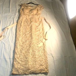 Cream  formal gown with intricate detail  . Size 14